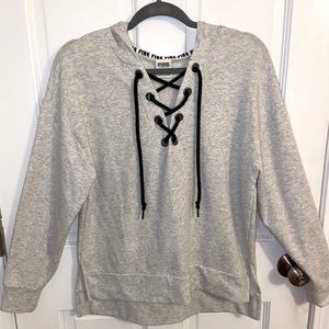 PINK light gray sweatshirt.
